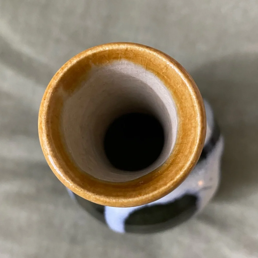 Handcrafted Ceramic Vase with Earthy Tones. UBV